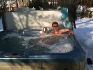 Ronney enjoying hot tubbing in the winter